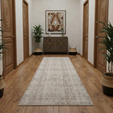 10' Ivory Brown And Gray Geometric Distressed Runner Rug With Fringe