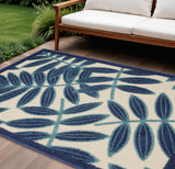 6' X 9' Navy Blue And Beige Botanical Leaves Indoor Outdoor Area Rug