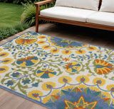 7' X 10' Ivory Blue Yellow And Orange Floral Indoor Outdoor Area Rug