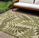 6' X 9' Ivory And Green Palm Leaf Indoor Outdoor Area Rug