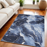 5' X 7' Ivory and Blue Abstract Power Loom Area Rug