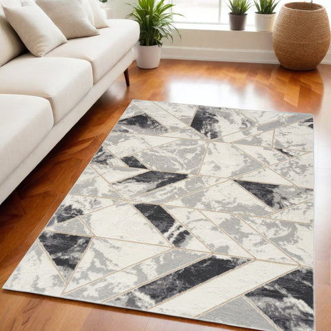 5' X 7' Ivory Black and Gray Abstract Non Skid Area Rug