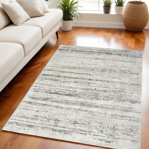 5' X 7' Cream and Gray Abstract Non Skid Area Rug