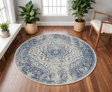 8' Ivory And Light Blue Floral Medallion Distressed Round Rug