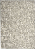 5' X 7' Beige and Gray Animal Print Power Loom Area Rug