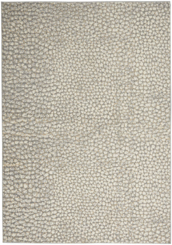 5' X 7' Beige and Gray Animal Print Power Loom Area Rug
