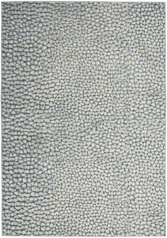 5' X 7' Ivory Blue and Gray Animal Print Power Loom Area Rug