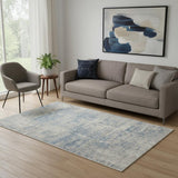 5' X 7' Ivory Blue And Gray Abstract Distressed Area Rug