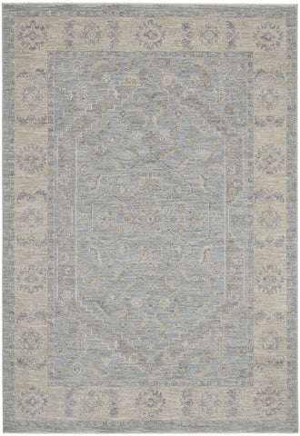 4' X 6' Beige and Blue Floral Power Loom Area Rug