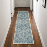 7' Ivory and Light Blue Geometric Distressed Runner Rug
