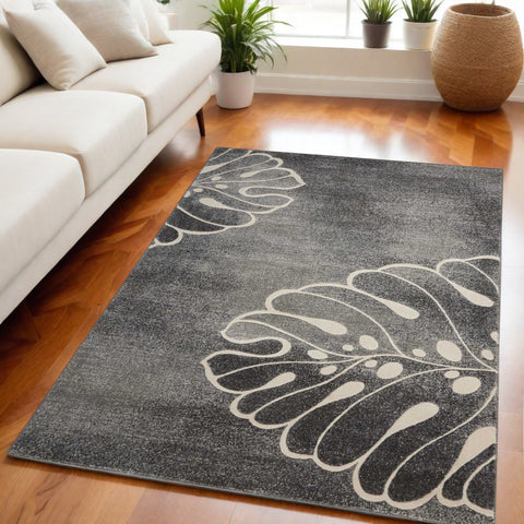 5' X 7' Ivory Black and Gray Botanical Leaves Non Skid Area Rug