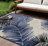 8' X 10' Navy Blue Ivory And Black Palm Leaf Indoor Outdoor Area Rug