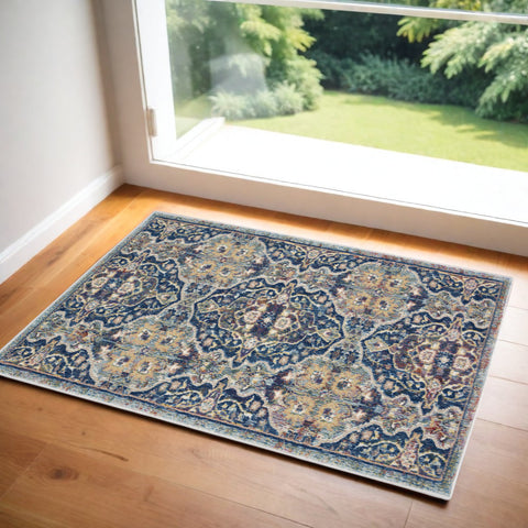 2' X 4' Blue and Yellow Floral Distressed Non Skid Area Rug
