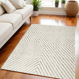 5' X 7' Ivory and Black Abstract Area Rug