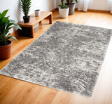 4' X 6' Charcoal and Ivory Abstract Shag Area Rug
