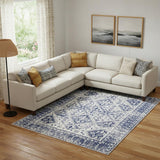 7' X 10' Ivory And Blue Geometric Distressed Area Rug