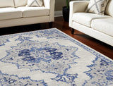 7' X 10' Ivory and Blue Floral Medallion Distressed Non Skid Area Rug