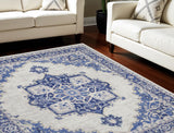 7' X 10' Ivory and Blue Floral Medallion Distressed Non Skid Area Rug