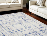 7' X 10' Ivory and Blue Abstract Distressed Non Skid Area Rug