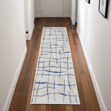 8' Ivory and Blue Abstract Distressed Non Skid Runner Rug