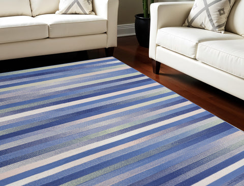 7' X 10' Ivory Tan and Blue Abstract Distressed Non Skid Area Rug
