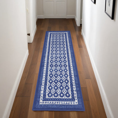 8' Ivory and Navy Blue Geometric Distressed Non Skid Runner Rug