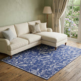 7' X 10' Ivory and Navy Blue Floral Distressed Non Skid Area Rug