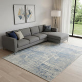 8' X 10' Ivory Blue And Gray Abstract Distressed Area Rug