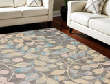 6' X 9' Beige Gray And Blue Botanical Leaves Area Rug