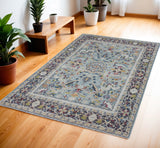 4' X 6' Teal Blue Orange and Black Floral Distressed Non Skid Area Rug