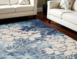 5' X 7' Navy Blue and Ivory Floral Area Rug