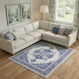 8' X 10' Ivory And Blue Floral Distressed Area Rug