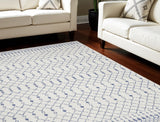 8' X 10' Ivory and Blue Geometric Distressed Non Skid Area Rug