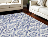 8' X 10' Ivory and Navy Blue Damask Distressed Non Skid Area Rug