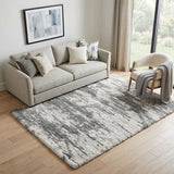 5' X 7' Charcoal and Ivory Abstract Shag Area Rug