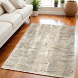 5' X 7' Beige and Ivory Abstract Shag Area Rug