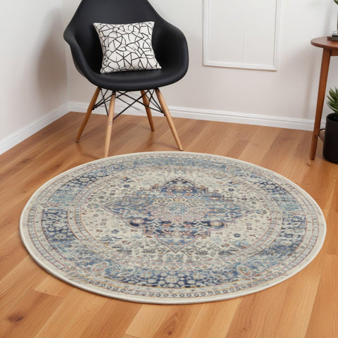 6' Ivory Blue And Orange Floral Distressed Round Rug