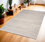 4' X 6' Ivory and Light Brown Abstract Washable Area Rug