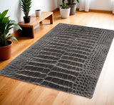 4' X 6' Beige Charcoal and Cream Animal Print Distressed Area Rug