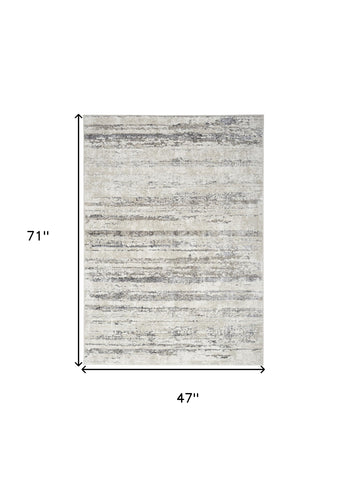 4' X 6' Cream and Gray Abstract Non Skid Area Rug