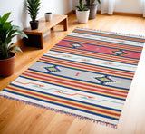 4' X 6' Ivory Southwestern Handmade Area Rug With Fringe