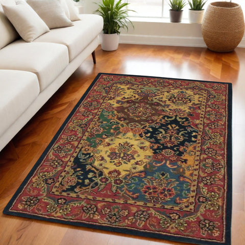 4' X 6' Tan Black and Red Wool Floral Area Rug