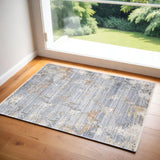 3' X 5' Beige Blue and Gray Abstract Area Rug With Fringe