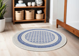 5' Ivory and Blue Geometric Distressed Round Rug