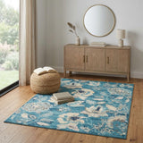 4' X 6' Turquoise Cream and Navy Blue Floral Distressed Area Rug
