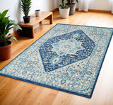 4' X 6' Ivory And Navy Blue Floral Medallion Distressed Area Rug