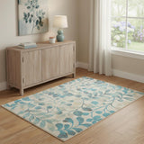 4' X 6' Ivory And Turquoise Botanical Leaves Area Rug