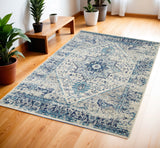 4' X 6' Ivory And Light Blue Floral Medallion Distressed Area Rug