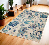 4' X 6' Ivory Navy Blue And Light Blue Floral Area Rug