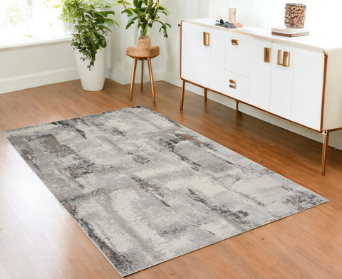 4' X 6' Ivory Black and Gray Abstract Non Skid Area Rug